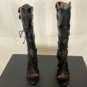 Rebecca Minkoff cut out black leather boots. Sexy